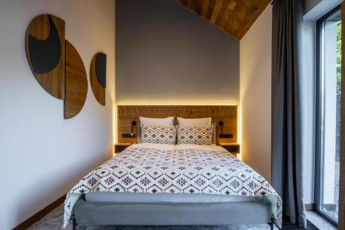 Ένα ή περισσότερα κρεβάτια σε δωμάτιο στο Apartel Villa Shayan