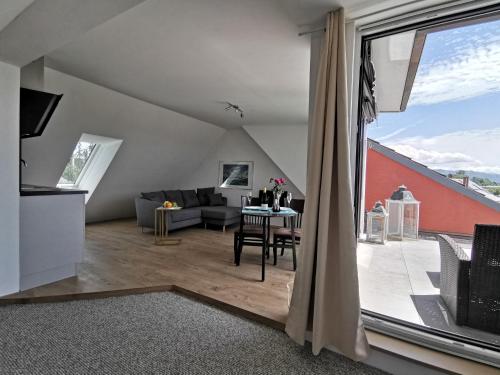 Posezení v ubytování Im Herzen von Wasserburg am Bodensee