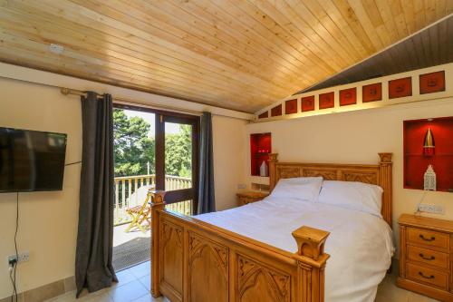 Ένα ή περισσότερα κρεβάτια σε δωμάτιο στο Bay Tree Lodge 35