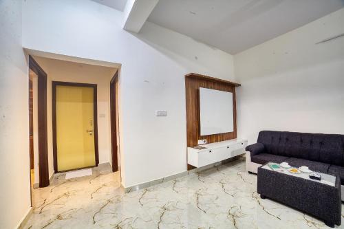 Χώρος καθιστικού στο Hotel Airport Southgate Bangalore