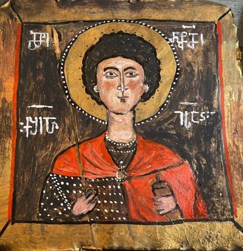 a painting of a woman holding an umbrella at OK Sahli in Shekvetili