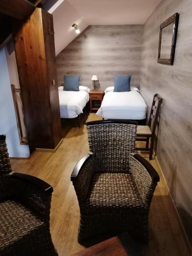 Postel nebo postele na pokoji v ubytování Hotel Casa Arcas