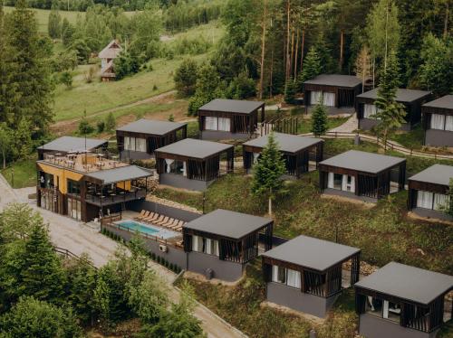 an aerial view of a house in the woods at Mandra Morion in Ogrody