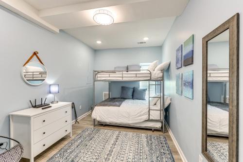a bedroom with two bunk beds and a mirror at Waterfront Lake Hamilton Vacation Rental with Dock! in Royal