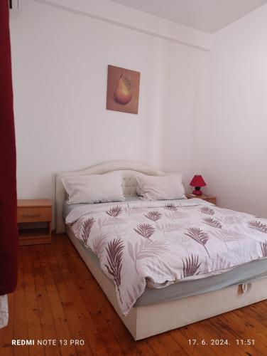 Postel nebo postele na pokoji v ubytování Apartments Salute