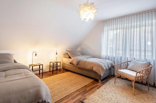 Katil atau katil-katil dalam bilik di Ferienwohnung in den Bachteln