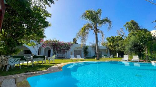 Gallery image of Residence Jannet: Oasis pour 16 en bord de mer in Hammamet Nord