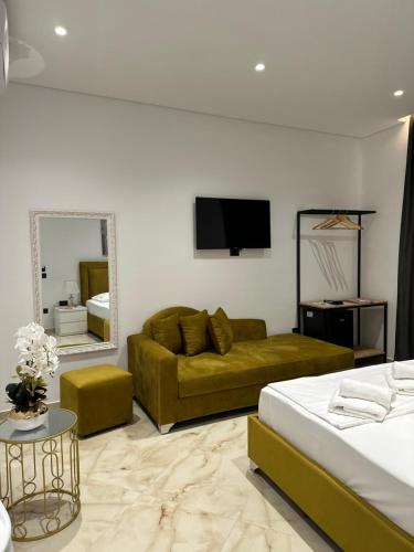 TV a/nebo společenská místnost v ubytování Suites by Era