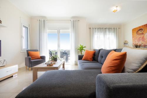 Χώρος καθιστικού στο Geas House Ammos