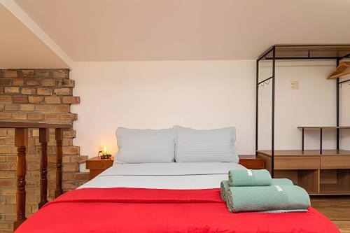 Ένα ή περισσότερα κρεβάτια σε δωμάτιο στο Sol & Charme em Santa Teresa