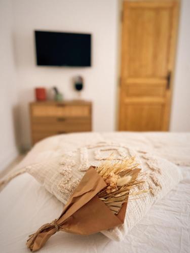 Postel nebo postele na pokoji v ubytování Oustau di Gaffo