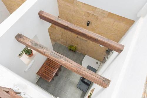 an overhead view of a room with a ceiling at Authentic 1st FL apartment at the 3 cities Marina in Cospicua