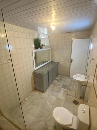 Koupelna v ubytování Quarto com varanda privada 3
