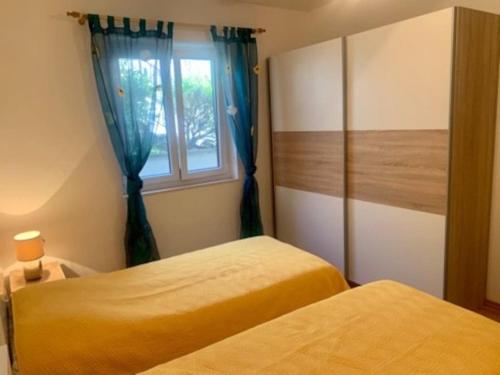 Katil atau katil-katil dalam bilik di Bayview villa