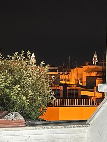 a view of a city skyline at night at Blumoon boutique in Andria