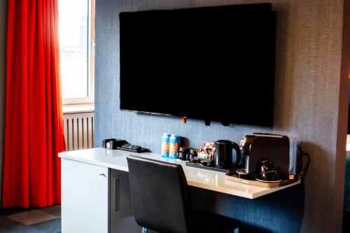 TV o dispositivi per l'intrattenimento presso ProfilHotels Richmond