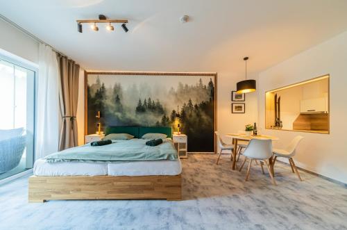 Postel nebo postele na pokoji v ubytování Luxusní apartmány Domovjanka - VELKÁ STOLOVÁ a MALÁ STOLOVÁ