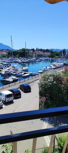a marina with boats parked in a parking lot at Sea and Sunshine in Tivat