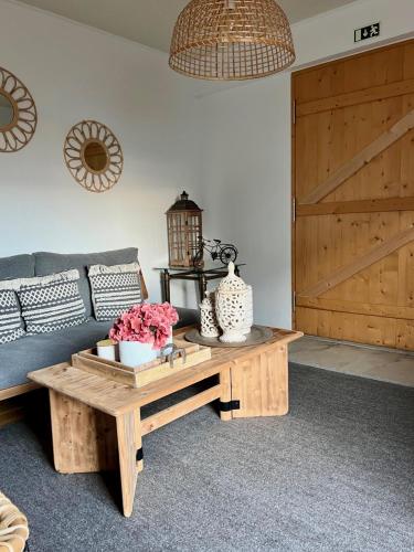 a living room with a couch and a coffee table at Ocean View Pico in Madalena