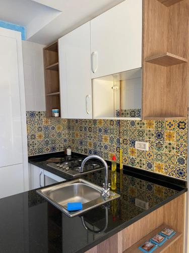 Kuchyň nebo kuchyňský kout v ubytování Marsa - Sidi Bousaid Lovely Authentic Apartment