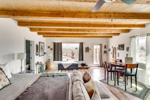 a living room with a couch and a table at Pet-Friendly El Prado Vacation Rental with Views! in El Prado