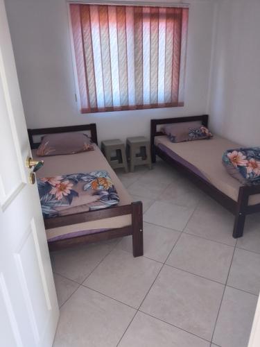 Postel nebo postele na pokoji v ubytování Apartmani Natura