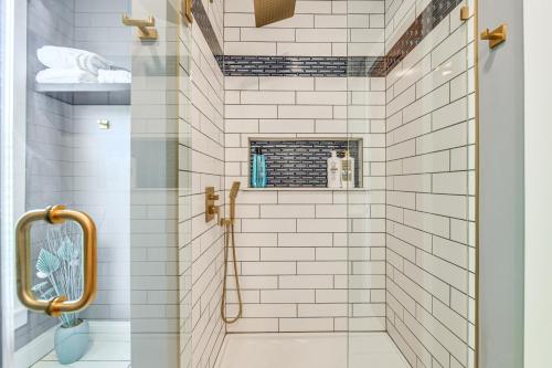 a bathroom with a shower with white subway tiles at Pet-Friendly Lancaster Home 13 Mi to Dtwn Buffalo in Lancaster