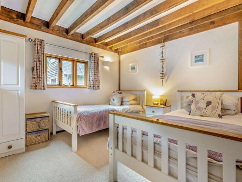 Ένα ή περισσότερα κρεβάτια σε δωμάτιο στο 3 Bed in Boscastle PENDW