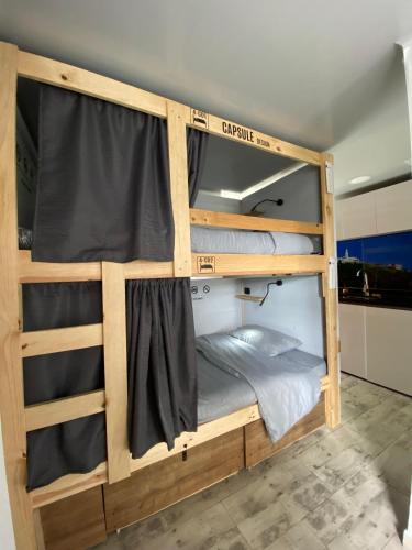 a couple of bunk beds in a room at Las Aguas Inner Experience in Bogotá