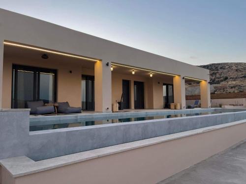 a swimming pool in the middle of a building at 180 Pool Villa in Anavissos