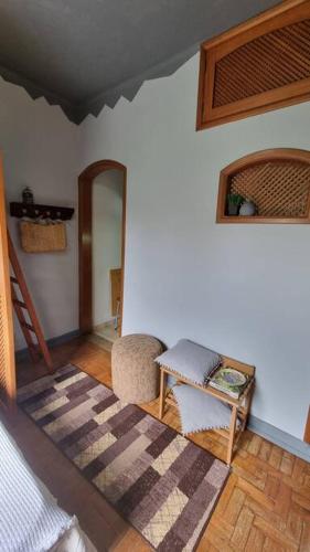 Ένα ή περισσότερα κρεβάτια σε δωμάτιο στο Loft charmoso com área de lazer