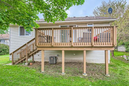 a large wooden deck in the backyard of a house at 4bd Central Location - Patio - Games in Ramsey