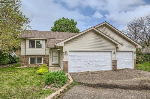 a house with a white garage in a yard at 4bd Central Location - Patio - Games in Ramsey