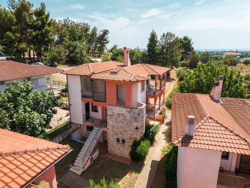an aerial view of a house with orange tile roofs at Sitholia Apartment Vatopedi in Vatopedi