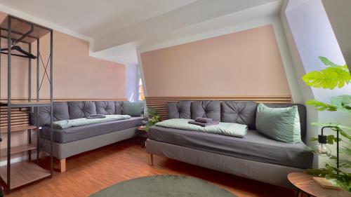 Area soggiorno di AuraLoft - 3 Zimmer, 2 Bäder, 2 Parkplätze, Balkon & Aufzug