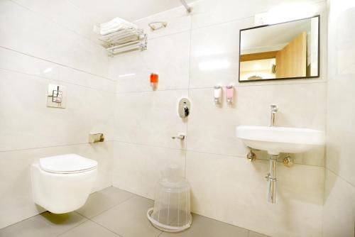 Koupelna v ubytování Oak Business Hotel