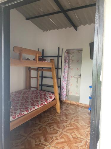 Ένα ή περισσότερα κρεβάτια σε δωμάτιο στο El encanto