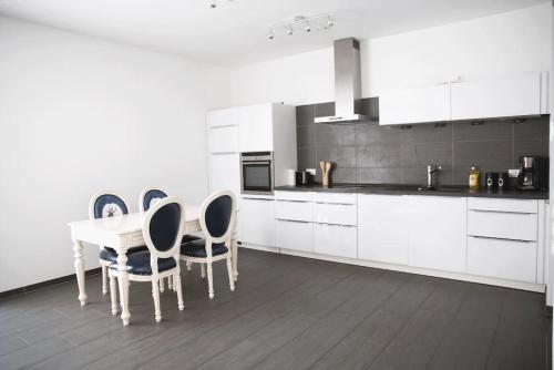 Cuina o zona de cuina de Modern & Bright 1BR Flat
