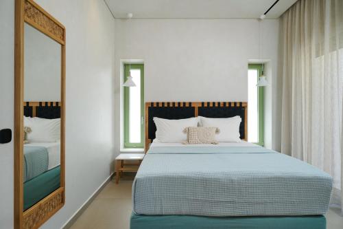 Ένα ή περισσότερα κρεβάτια σε δωμάτιο στο NOMAS VILLAS With Private Pool