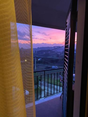 a view of a sunset from a balcony at Casa Di Campagna tra borghi e castelli in Borgo a Buggiano