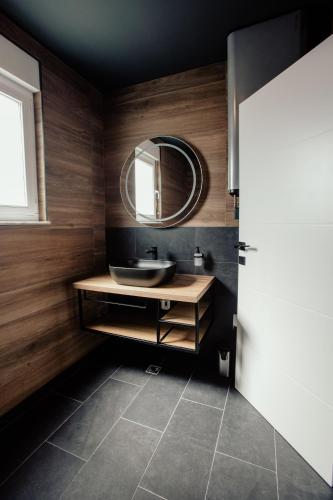 a bathroom with a sink and a mirror at BRAND NEW! Villa Adriatic Bay2 with a private pool in Novalja