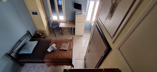 an overhead view of a living room with a couch at KAMPANI STUDIO in Chios