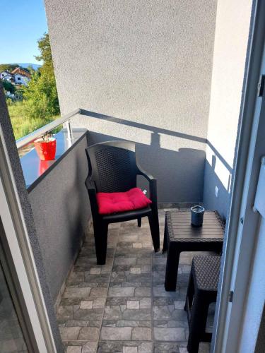 Un balcón o terraza de Apartman Aura