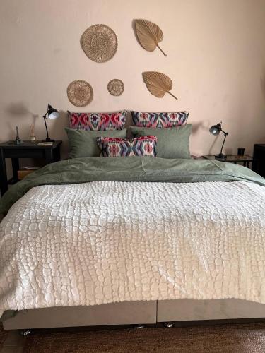Ένα ή περισσότερα κρεβάτια σε δωμάτιο στο Mosquito Guest House 2