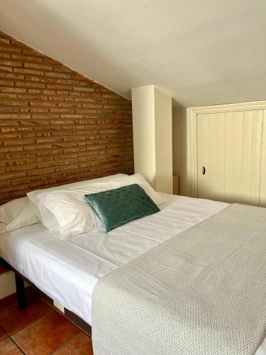 Ένα ή περισσότερα κρεβάτια σε δωμάτιο στο Apartamentos Ubaga