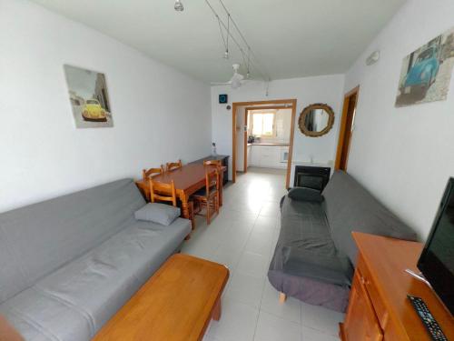 Televízia a/alebo spoločenská miestnosť v ubytovaní Apartment Austral 5