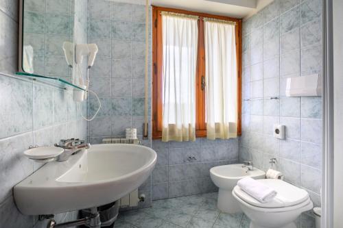 Koupelna v ubytování Hotel Vico Alto Siena