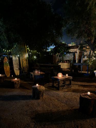 a park at night with a table and candles at Ocean view suite in Haifa