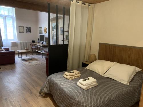 Posteľ alebo postele v izbe v ubytovaní le loft 19