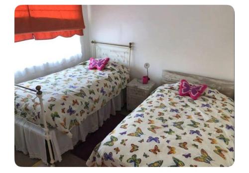 Ένα ή περισσότερα κρεβάτια σε δωμάτιο στο Departamento Santo Domingo